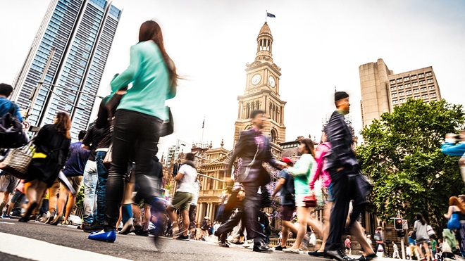 crowd of people walking in Sydney